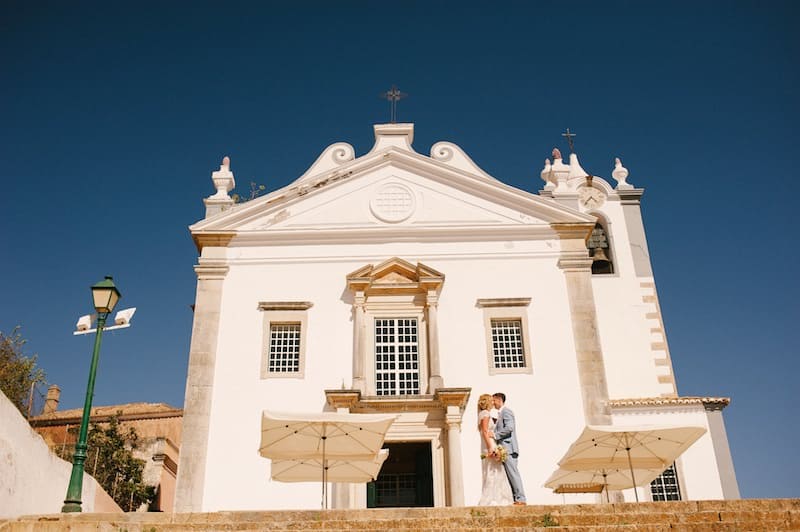 portrait of bride and groom at the church