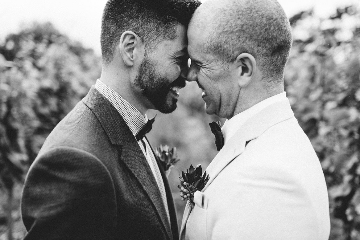 Tasmania wedding photographer black and white portrait of groom and groom same sex wedding
